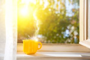 coffee mug in a window