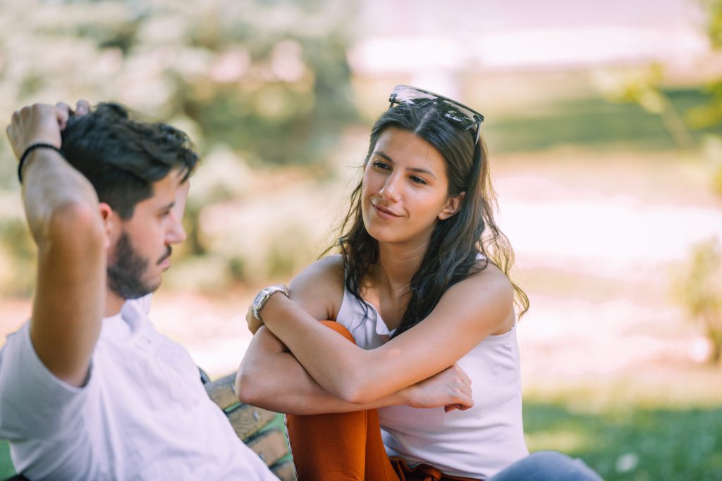 two people engaged in a conversation